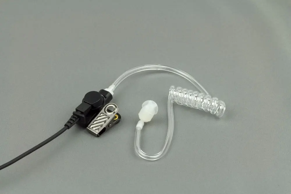 Acoustic tube style radio earpiece